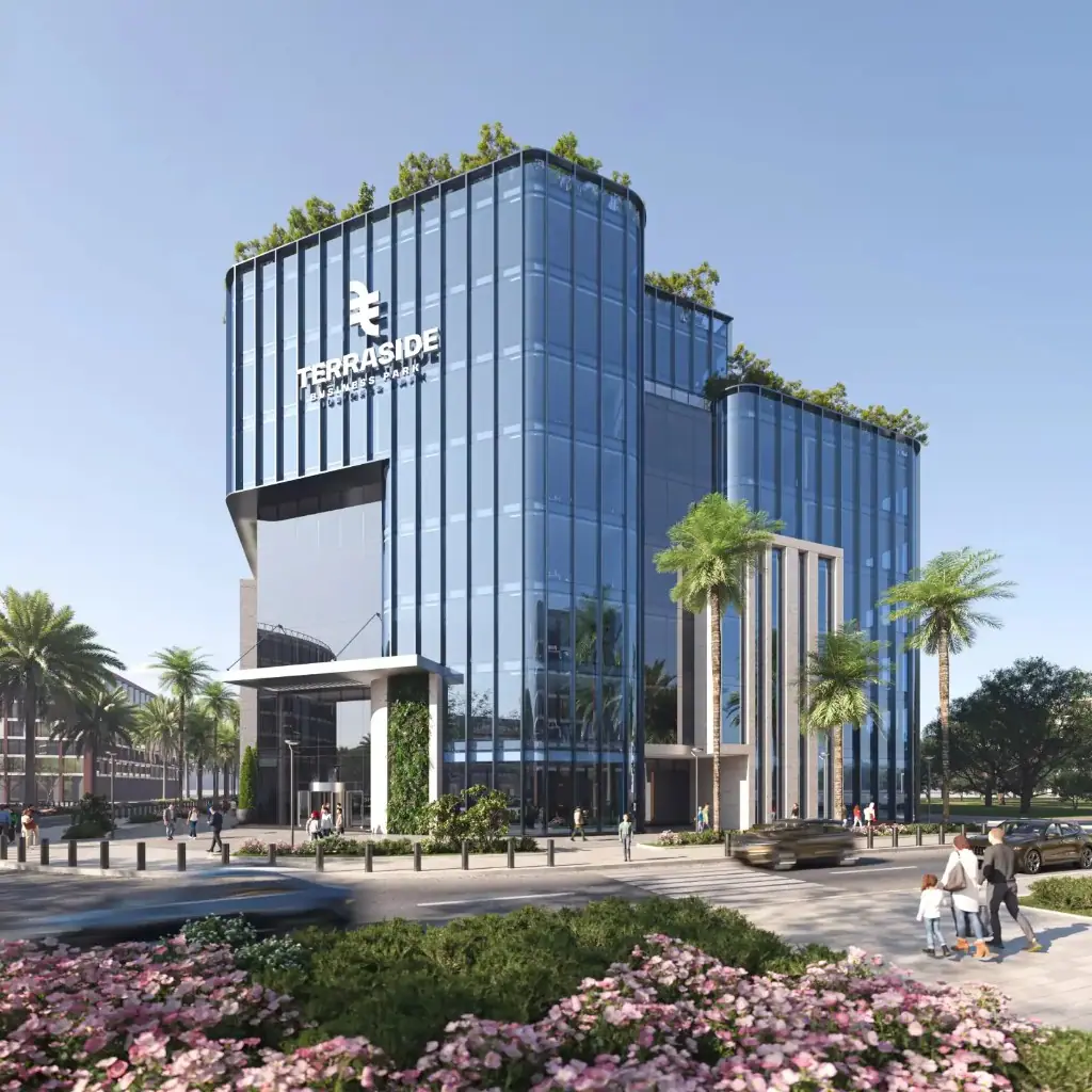 Front view of Terraside Business Park with glass facade, palm trees, and landscaped boulevard